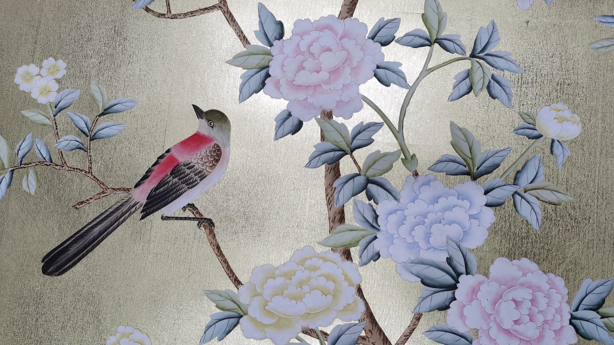 Close-up of peony and songbirds brushwork on hand-painted gold leaf wallpaper panel