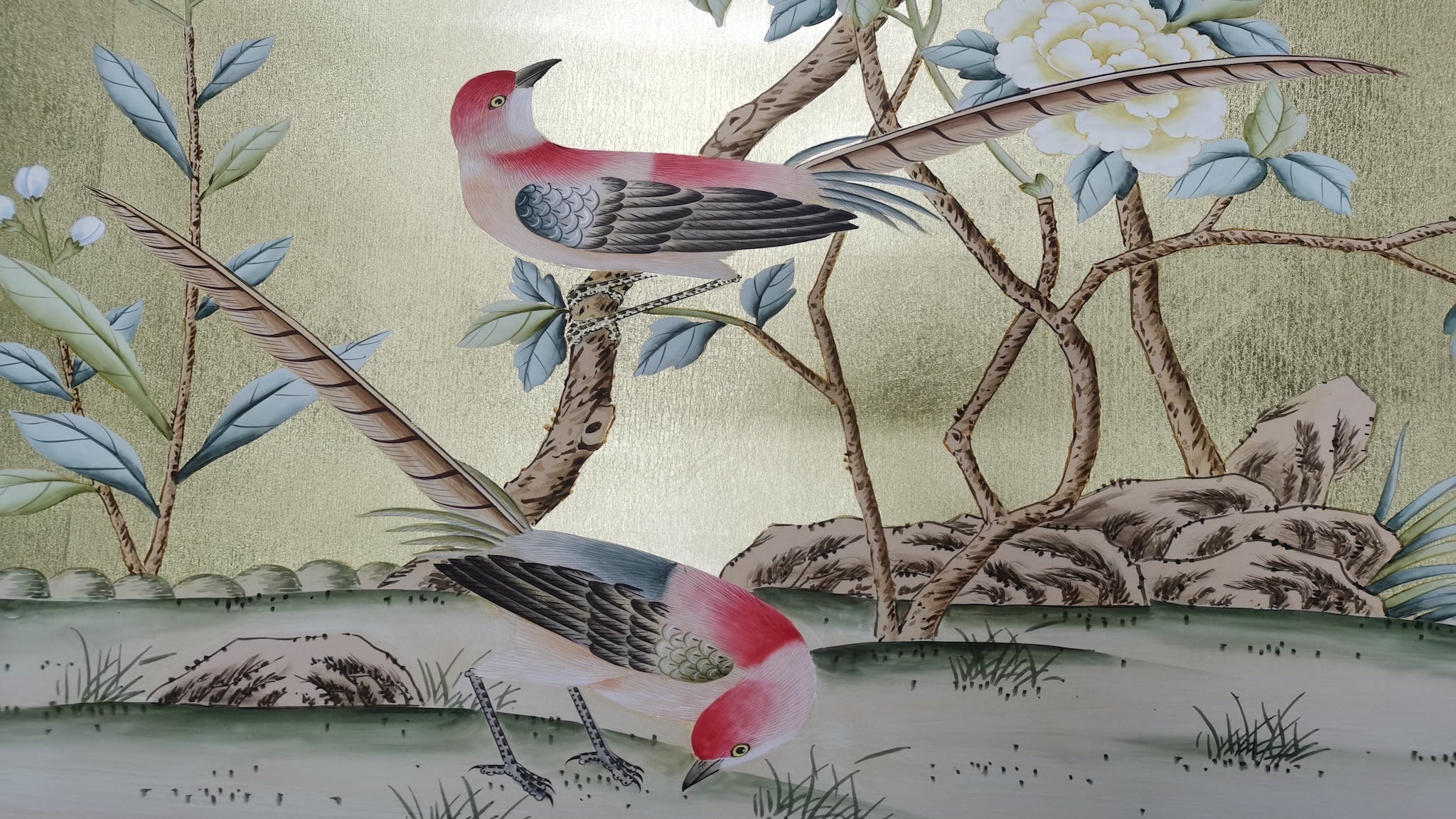 Close-up of peony and songbirds brushwork on hand-painted gold leaf wallpaper panel