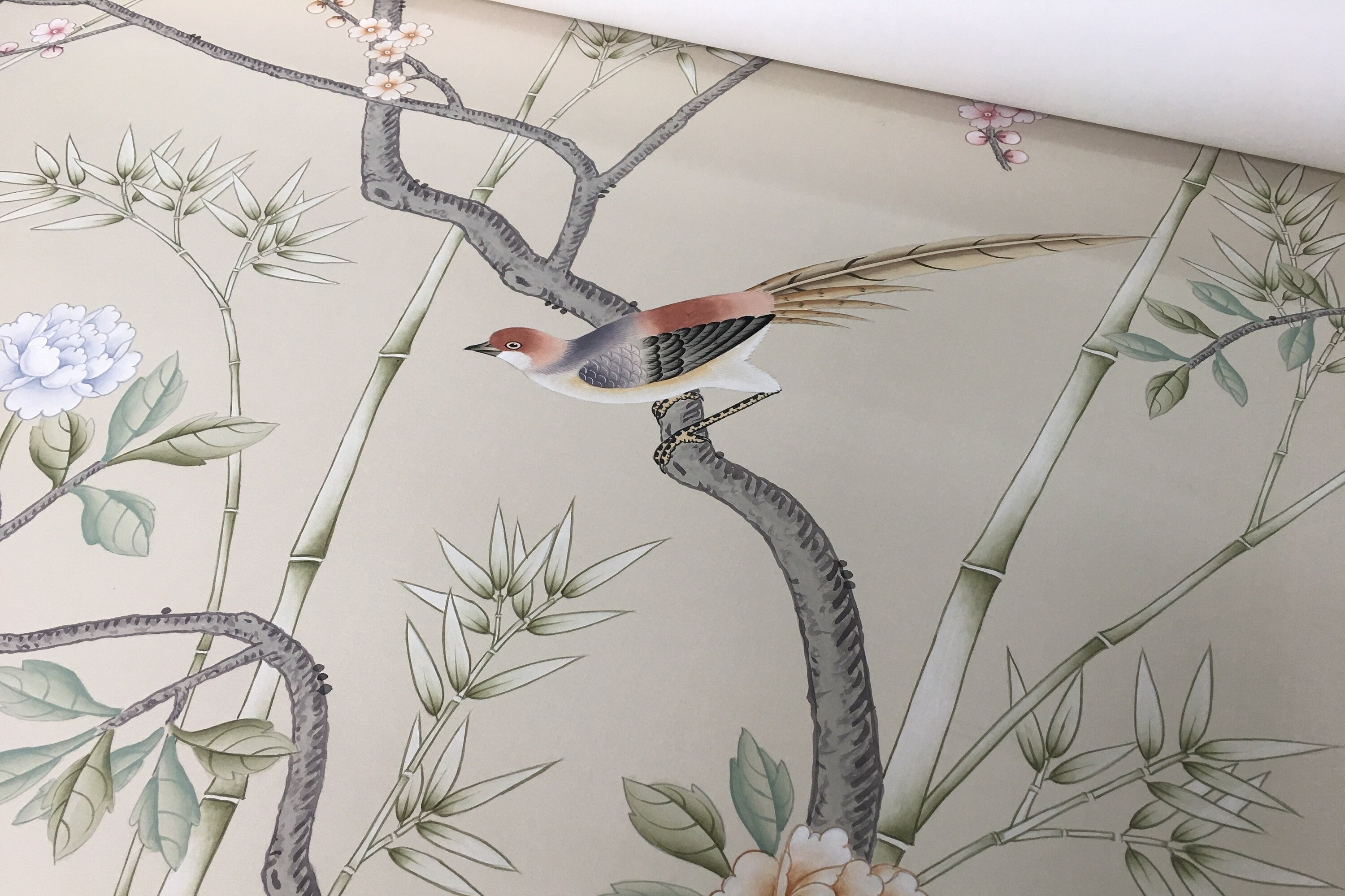 Custom-made Chinoiserie hand-painted wallpaper with intricate floral and bird motifs, tailored to fit any wall size and color scheme.